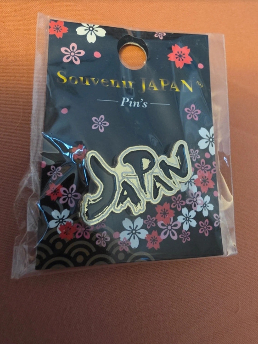 Gold and Black 'Japan' Script Brooch Pin -